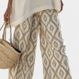 Σύνολο Boho Chic Daisy: Μακριά Μπλούζα και Εκτυπωμένα Παντελόνια για Μοναδικό Στυλ