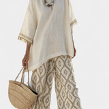 Σύνολο Boho Chic Daisy: Μακριά Μπλούζα και Εκτυπωμένα Παντελόνια για Μοναδικό Στυλ